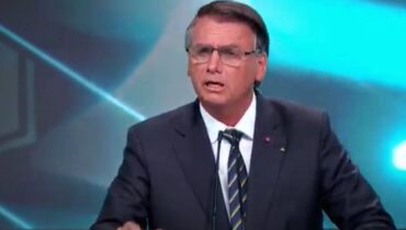 Imagem mostra o candidato Jai Bolsonaro, em debate do SBT.