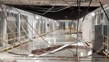 Imagem mostra um prédio destelhado por dentro.