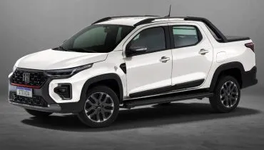Imagem mostra uma Fiat Strada cabine dupla na cor branca.
