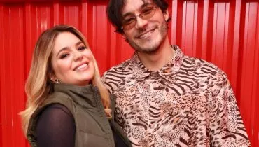 Imagem mostra Viih Tube e Eliezer em um fundo vermelho.