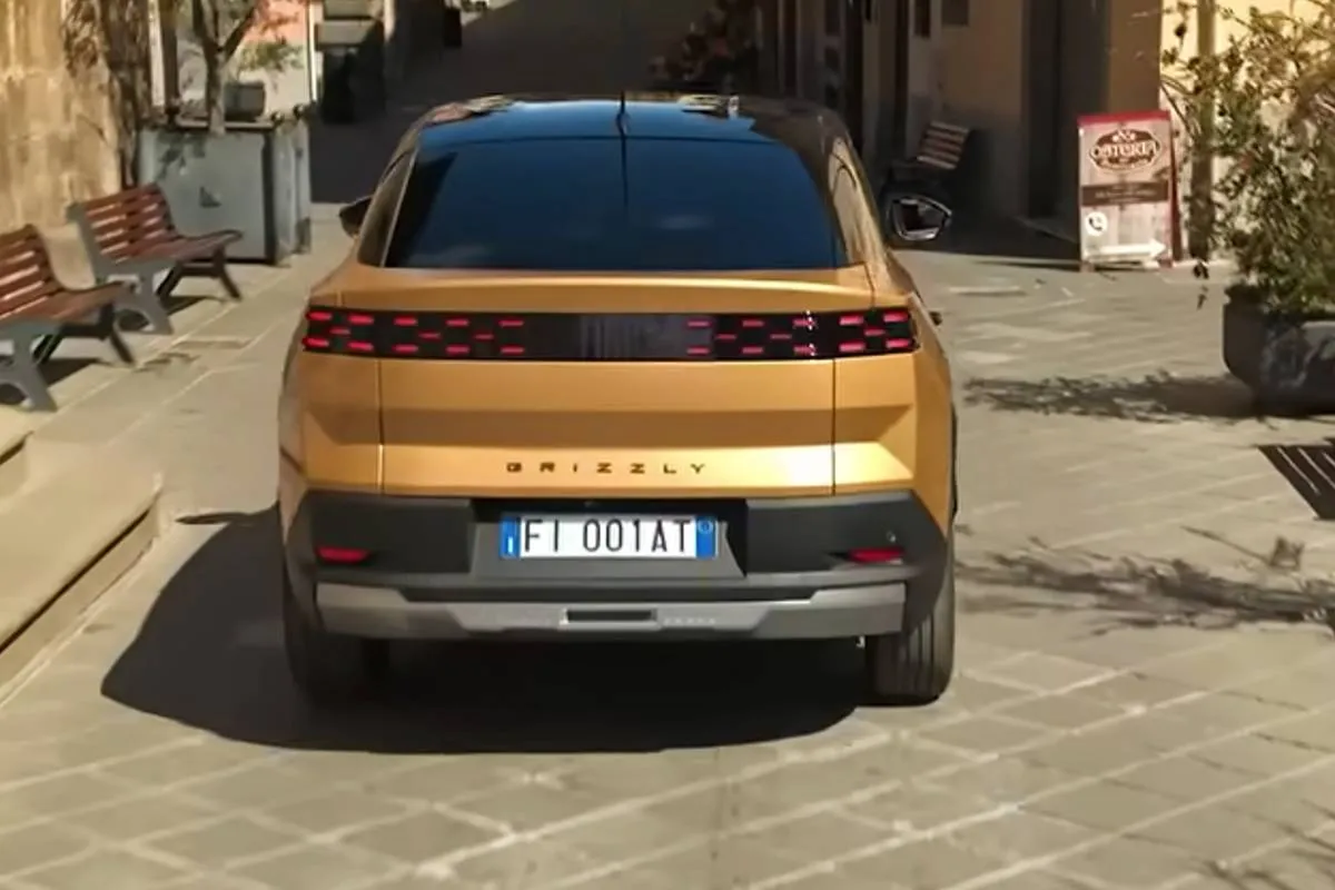 Imagem mostra o novo Fiat Grizzly Fastback na cor dourada.