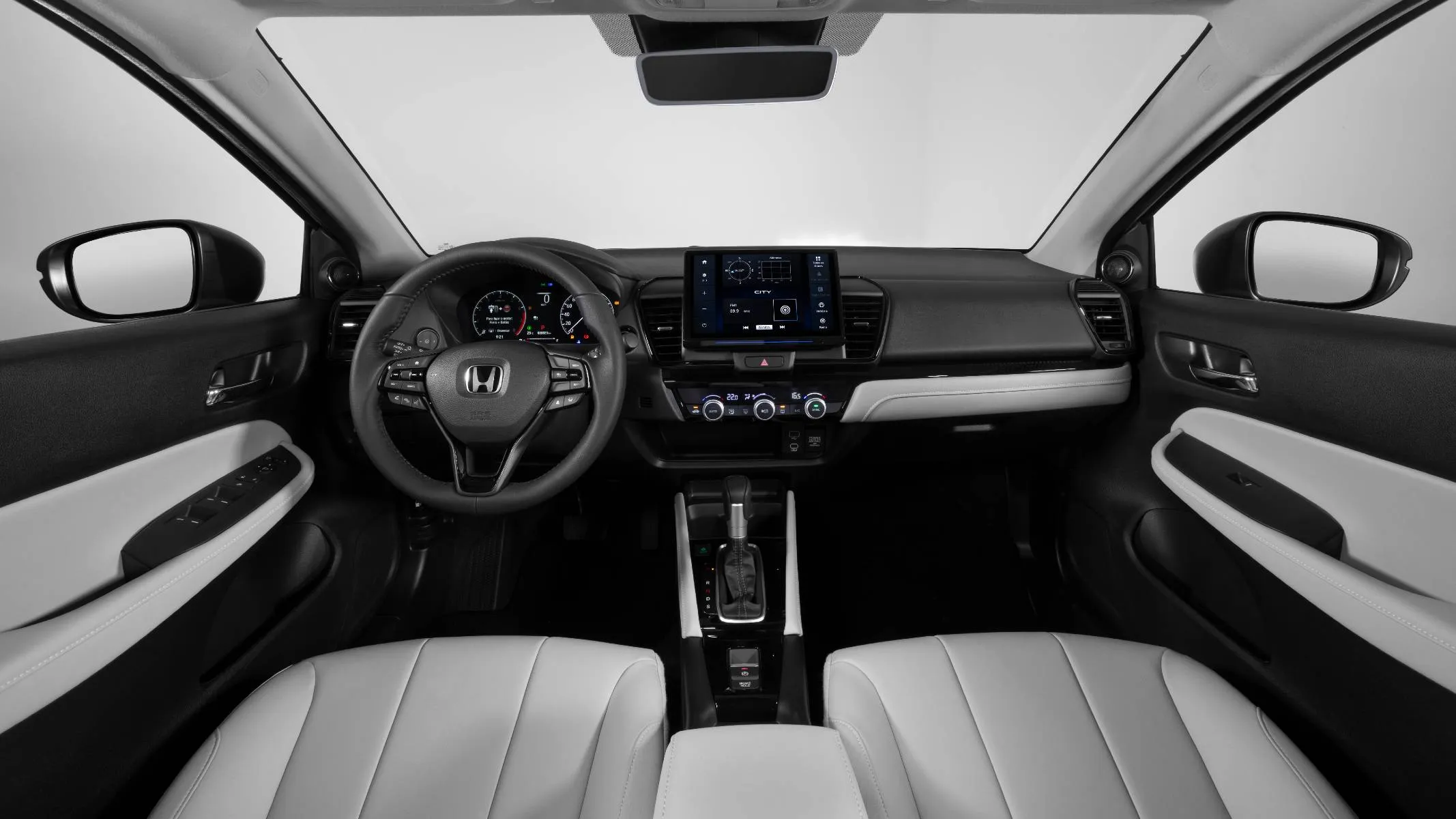 Honda City Sedan Touring 2027 interna - A cabine da versão Touring vem equipada com a nova central multimídia de 10” compatível com comandos por gestos de dois ou quatro dedos, além de conectividade sem fio com Apple CarPlay e Android Auto.