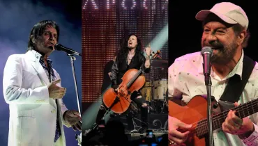 Fotografia em tríptico dividida verticalmente em três quadros, apresentando retratos de três artistas musicais em apresentações ao vivo. À esquerda, no primeiro quadro em plano médio, destaca-se o cantor Roberto Carlos apresentando-se em um palco. Homem de pele clara e cabelos escuros, ele canta em um microfone fixo em pedestal, vestindo elegante terno branco com camisa social estampada aberta na gola. Ao centro, no segundo quadro em plano médio, um violoncelista da banda Apocalyptica performa energeticamente no palco. Homem de cabelos longos e escuros, vestindo roupas pretas, ele toca seu violoncelo sob iluminação cênica e um painel de LED ao fundo. À direita, no terceiro quadro em plano médio, o cantor e compositor Almir Sater toca viola caipira enquanto canta em um microfone. Homem de pele clara, barba e bigode grisalhos, ele usa boné claro e camisa social branca com delicados detalhes estampados, sustentando o instrumento com uma correia preta. Ao fundo de cada quadro, a iluminação cênica e a atmosfera de show ao ar livre ou em casa de espetáculos compõem o ambiente de cada apresentação.