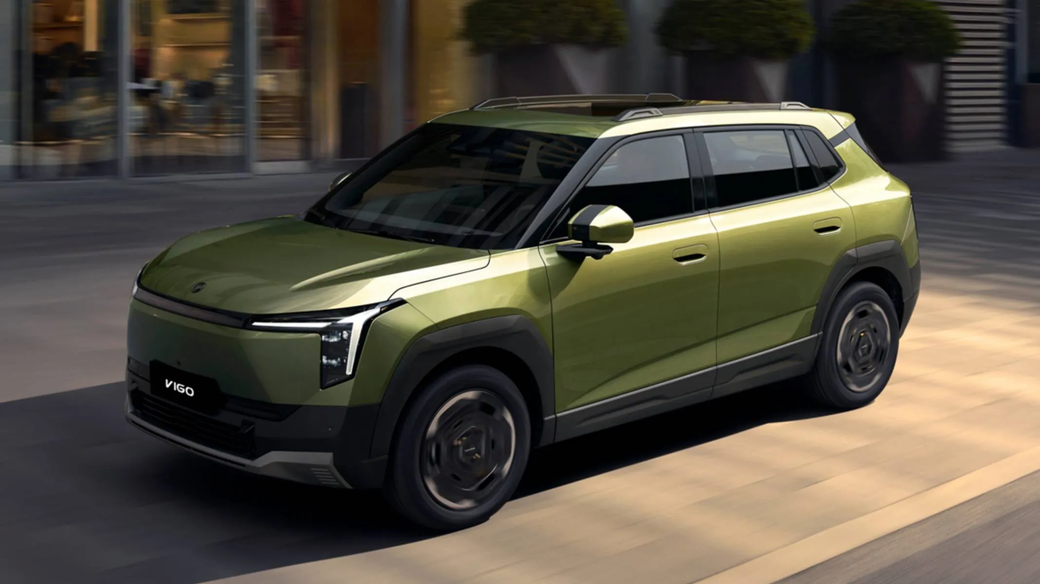 Dongfeng Vigo dianteira verde - Projetado para a eficiência, o DFM Vigo traz conjunto óptico moderno e bateria LFP com suporte a recarga rápida de até 167 kW.