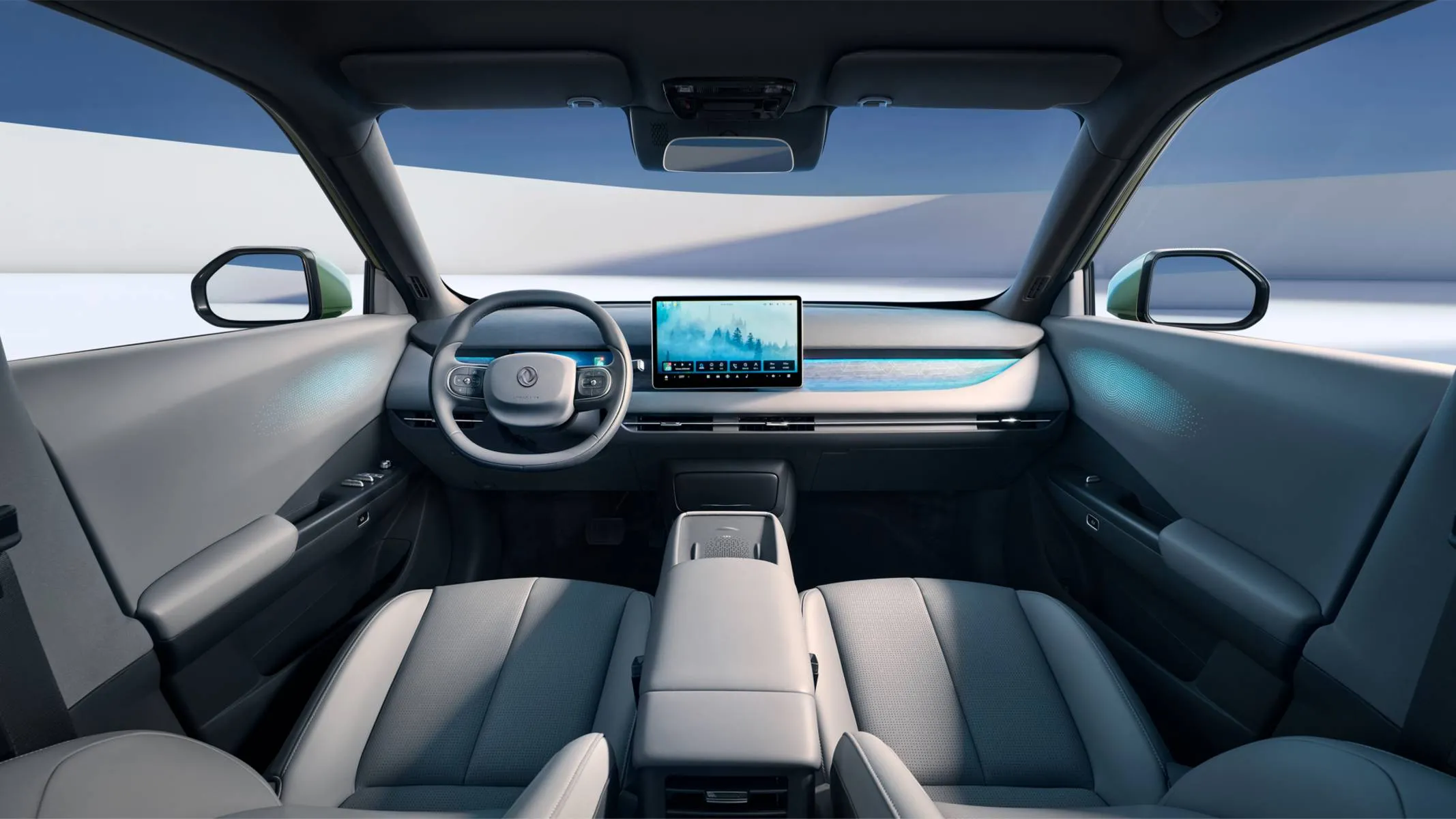 Dongfeng Vigo Interna - O interior do DFM Vigo alia tecnologia e conforto com tela de 8,8” no painel digital, multimídia Snapdragon de 12,8”, teto panorâmico e bancos com aquecimento e ventilação.
