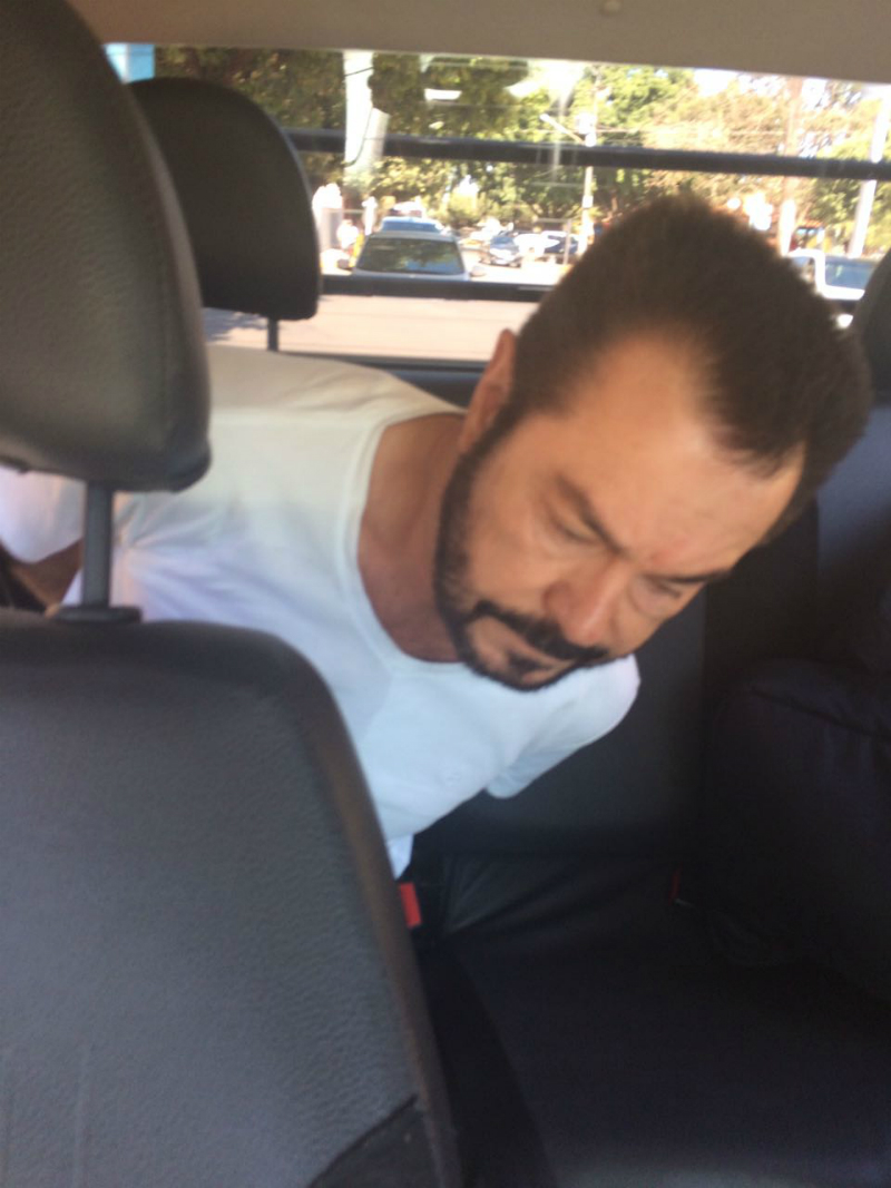 "Cabeça branca", pouco depois de ser detido pela polícia. Foto: Reprodução/WhatsApp