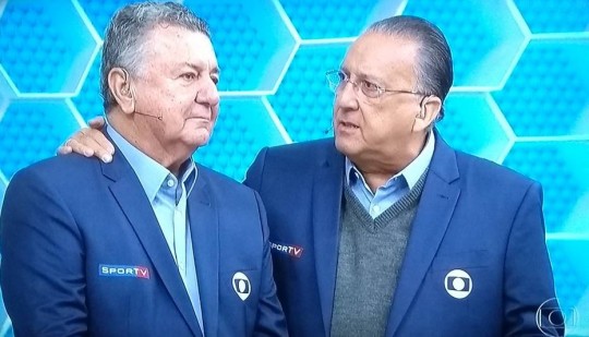 Arnaldo César Coelho e Galvão Bueno. A despedida do comentarista foi o assunto mais falado. Mais que o jogo. Foto: Reprodução/TV Globo
