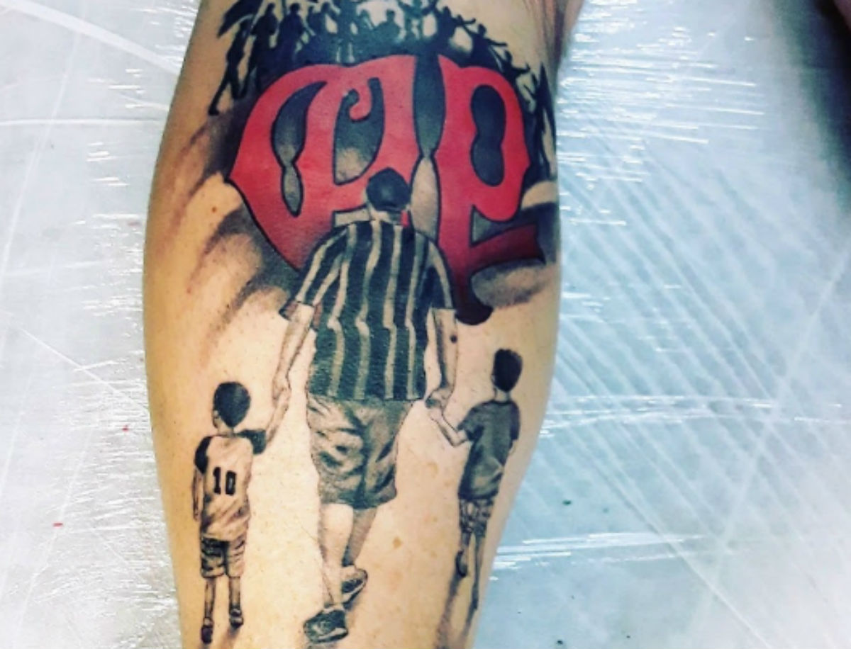 Eloir reproduziu uma foto com os dois filhos a caminho de um jogo do Furacão na tatuagem que traz no braço. Foto: Arquivo Pessoal